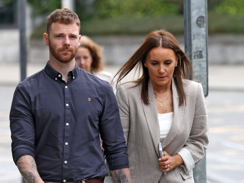 Pte Seán Rooney's mother, Natasha, and her husband, Paul, are pictured outside Dublin District Coroner's Court last July. Photograph: Colin Keegan/Collins