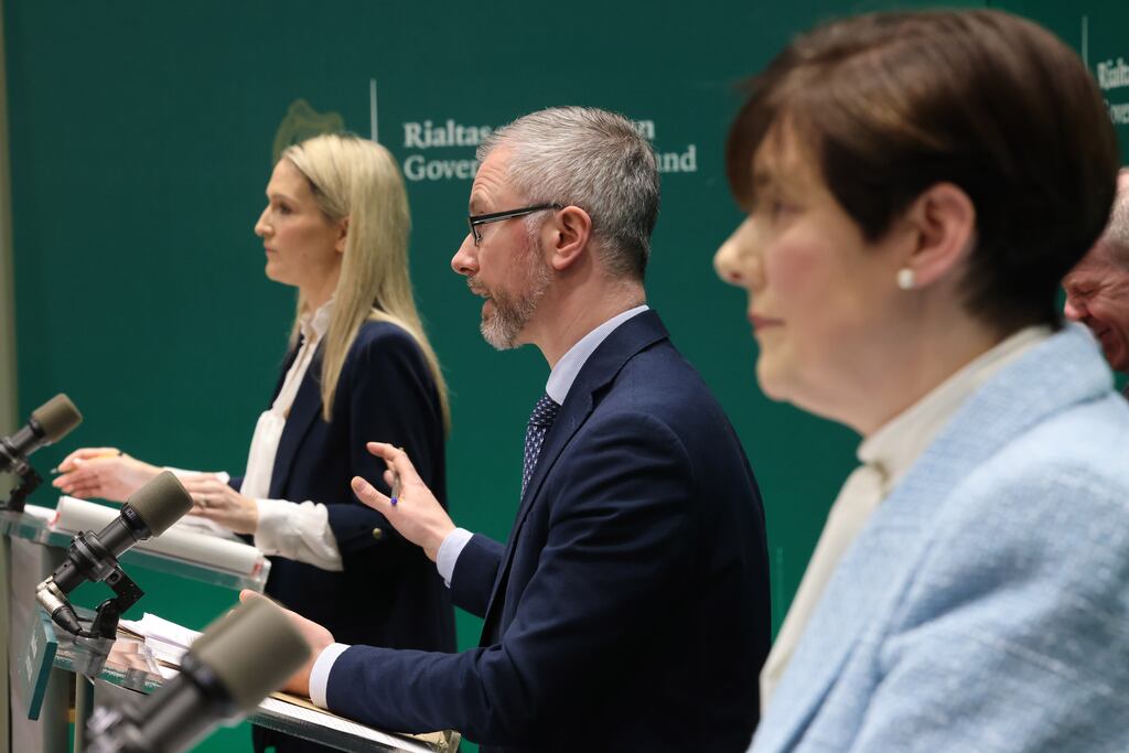 Minister for Integration Roderic O’Gorman stood in Government Buildings on Wednesday, flanked by Minister for Justice Helen McEntee and Minister for Education Norma Foley, to present his department’s revised plan to rescue the State’s international protection accommodation system. Photograph: Dara Mac Dónaill/The Irish Times