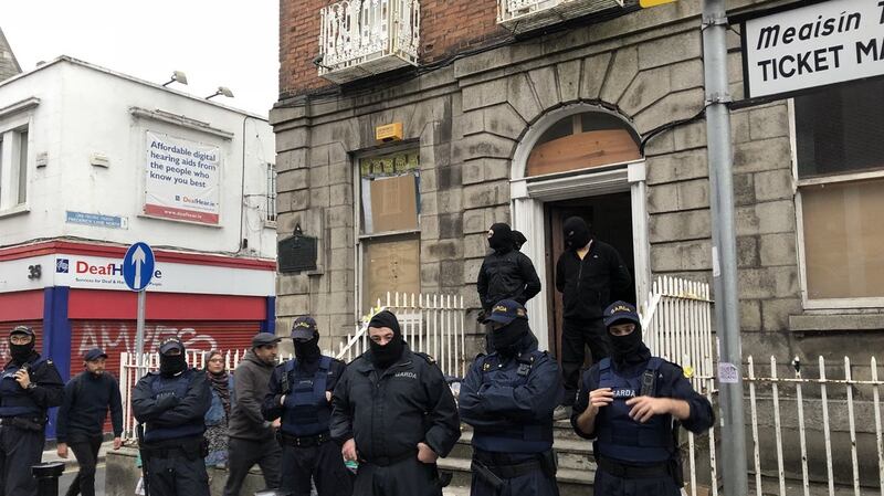 Gardaí and security guards at 34 North Frederick Street on Tuesday night. Photograph: Jack Power
