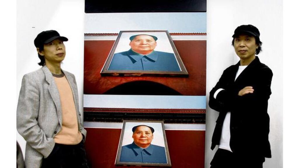 BROTHERS IN ART Gao Qiang and Gao Zhen stand beside their piece The Installation on Tiananmen