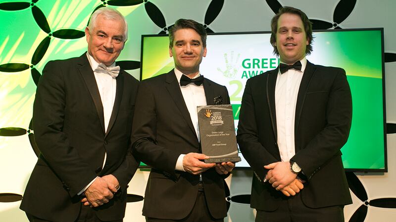 Gavin Whitaker, Director, Clearstream presents the Green Large Organisation of the Year award to John Durkan & Barry O'Donovan, ABP Food Group.