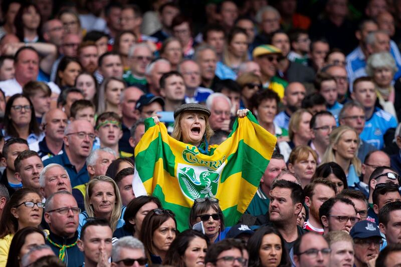 NOT ANOTHER DUBLIN TRIP? A Kerry fans displays the colours during the final moments of the game. The All-Ireland will be replayed in Croke Park after the game was a draw. Photograph: Tom Honan