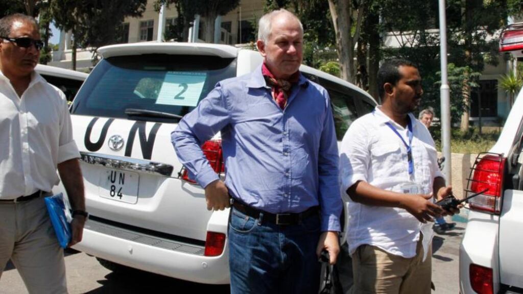 Ake Sellstrom (C), the head of a U.N. chemical weapons investigation team, stands outside Yousef al-Azma military hospital in Damascus. Photograph: Reuters/Khaled al-Hariri