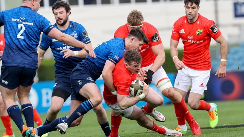 Munster’s Chris Farrell is tackled by Ross Byrne of Leinster during the Guinness Pro 14 Final at the RDS. Photograph: Billy Stickland/Inpho