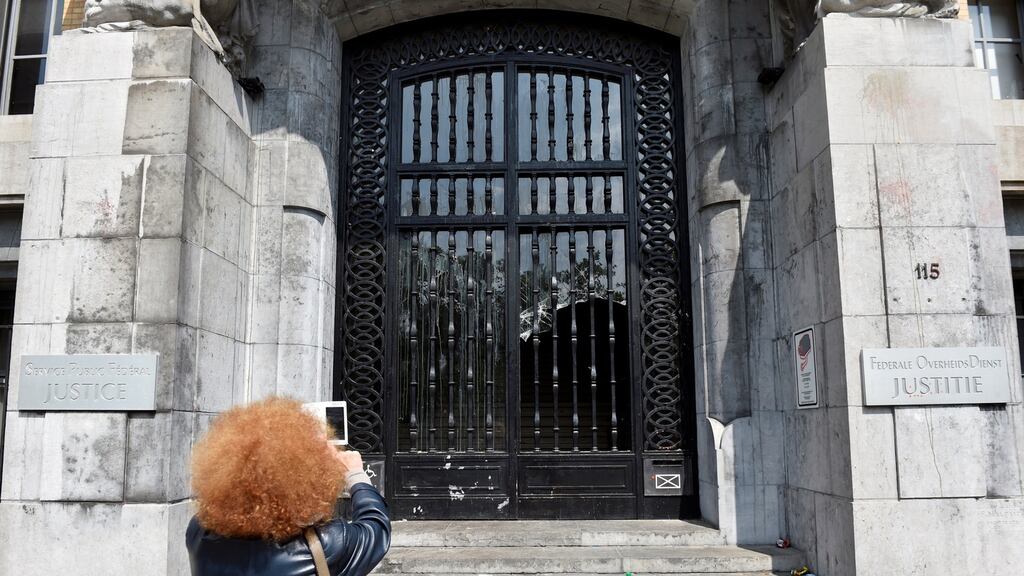 Shattered glass in the door of the Belgian ministry of justice broken by prison officers during a demonstration. Guards have been on strike for three weeks in a protest over pay cuts and working conditions in Brussels. Photograph: Eric Vidal/Reuters