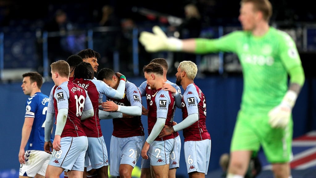 Aston Villa players celebrate Anwar El Ghazi’s winner at Goodison Park. Photograph: PA