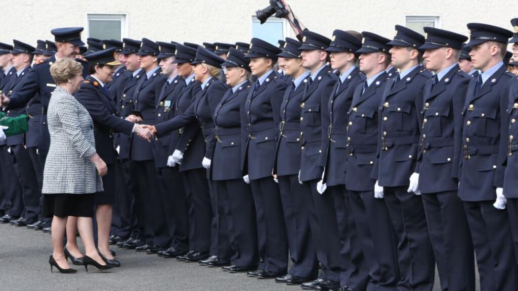 Attending the Garda graduations in Templemore on Thursday were the Minister for Justice Frances Fitzgerald, meeting the graduates as Garda Commissioner Nóirín O’Sullivan hands out their Garda id cards. Photograph Liam Burke/Press 22