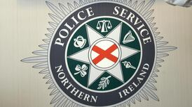 Man (22) held after stolen car crashes in Belfast