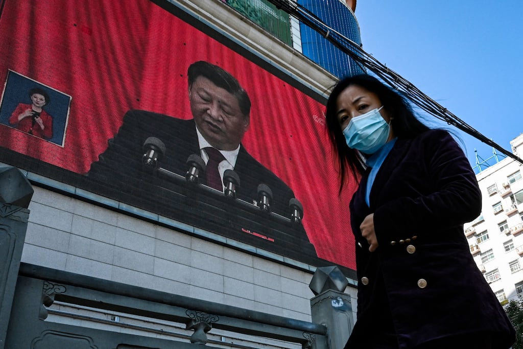 An outdoor screen shows the speech of Chinese president Xi Jinping during the opening session of the 20th Chinese Communist Party Congress. Photograph: JADE GAO/AFP via Getty Images