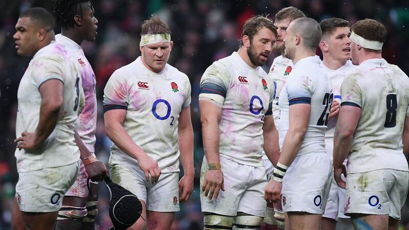 The English players react after conceding a try. Photograph: Laurence Griffiths/Getty Images