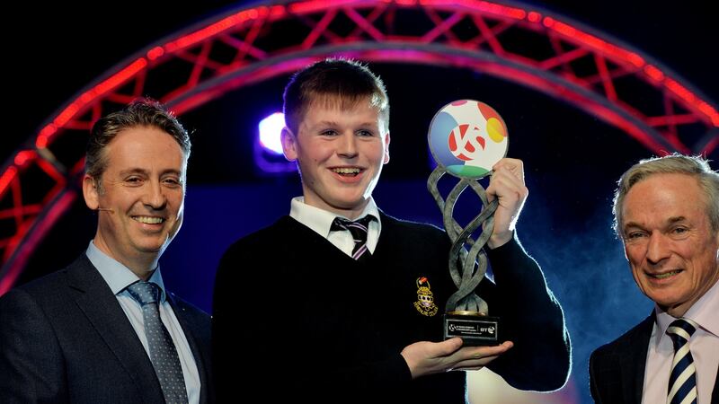 January 13th, 2017: Shay Walsh, Managing Director BT Ireland (left) and Richard Bruton (right), with Overall BT Young Scientist & Technologist of the Year 2017 Shane Curran. Photograph: Alan Betson/ The Irish Times