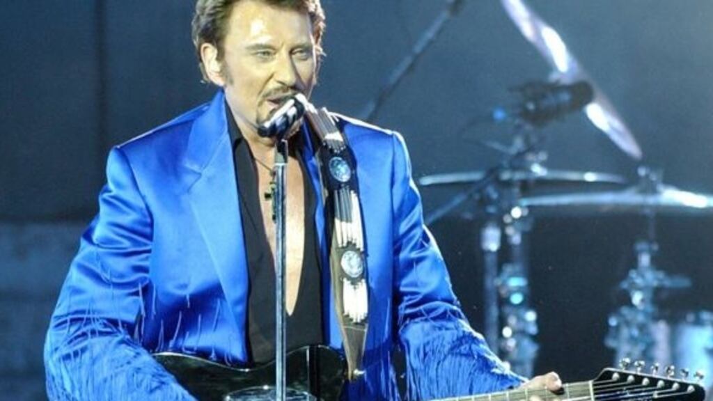 Johnny Hallyday performing in 2003. Photograph: Nabil Mounzer/EPA
