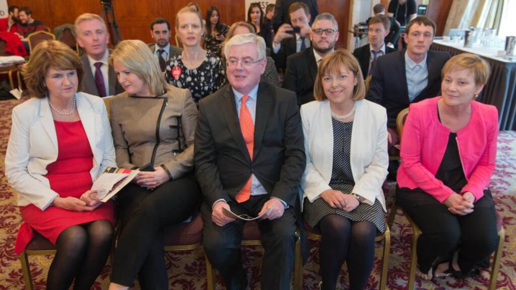 Tánaiste Eamon Gilmore, flanked by Joan Burton, candidate Lorraine Higgins, Emer Costello and Phil Prendergast at the launch of the Labour European and local election manifestos yesterday. Photograph: Brenda Fitzsimons