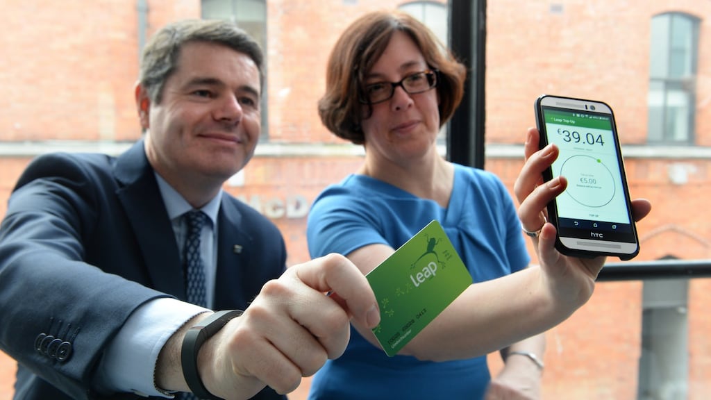 Minister for Transport Paschal Donohoe and Anne Graham, chief executive of the National Transport Authority, at the launch of a new Leap Card application for Android phones. Photograph: Cyril Byrne/The Irish Times.