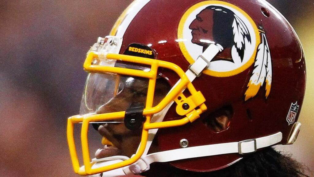 Washington Redskins quarterback Robert Griffin III . In a landmark decision, the Patent and Trademark office found that the NFL team name cannot be trademarked under federal law, which prohibits names that “may disparage” individuals or groups, or “bring them into contempt or disrepute”. Photograph: Gary Cameron/Reuters