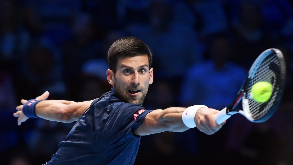 Novak Djokovic returns the ball to  Dominic Thiem during their singles group match of the ATP World Tour Finals. Photograph: Andy Rain/EPA