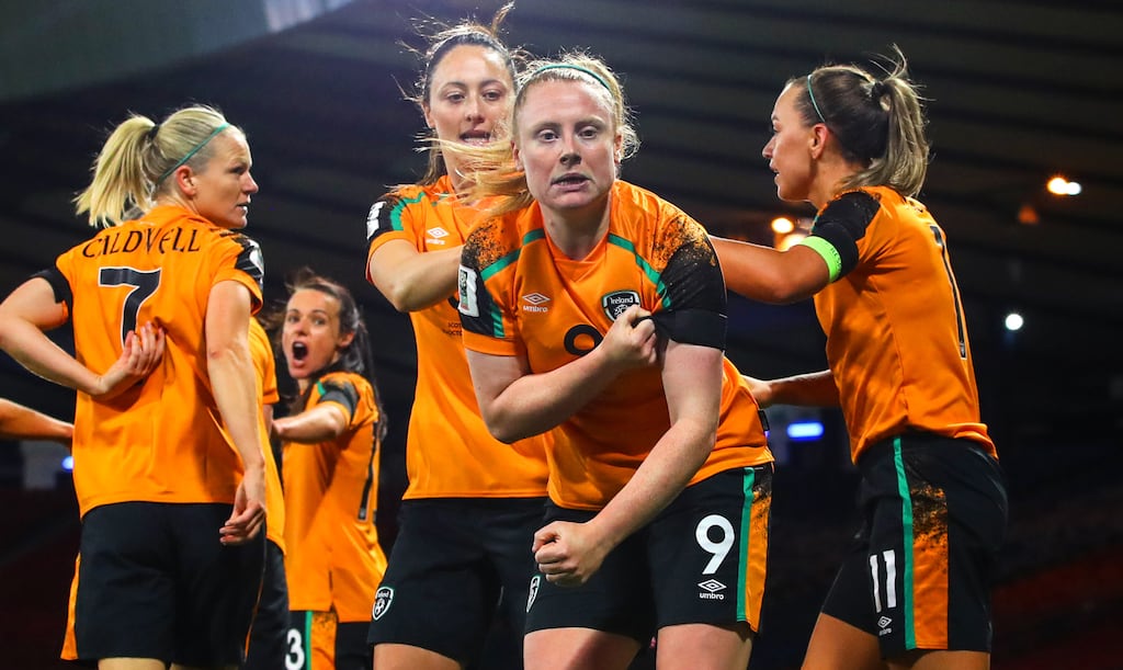 Ireland’s Amber Barrett celebrates scoring her winning goal against Scotland by gesturing to the black armband worn in memory of those affected by the tragedy in Creeslough in her native Donegal. Photograph: Ryan Byrne/Inpho