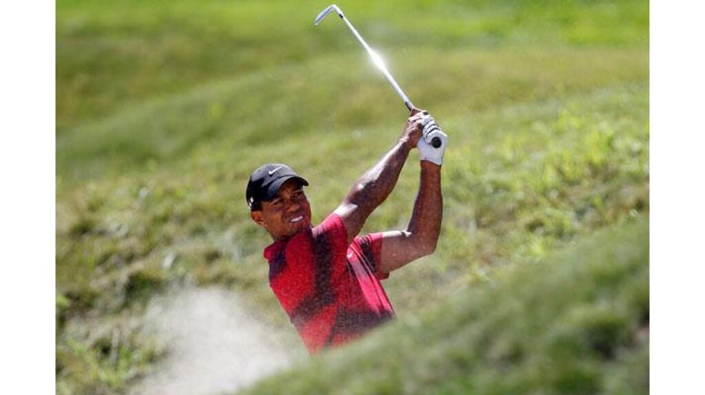 Tiger Woods hits from a bunker on the 11th during the final round of the 92nd PGA Golf Championship at Whistling Straits in Wisconsin. - (Photograph: Jeff Haynes/Reuters)