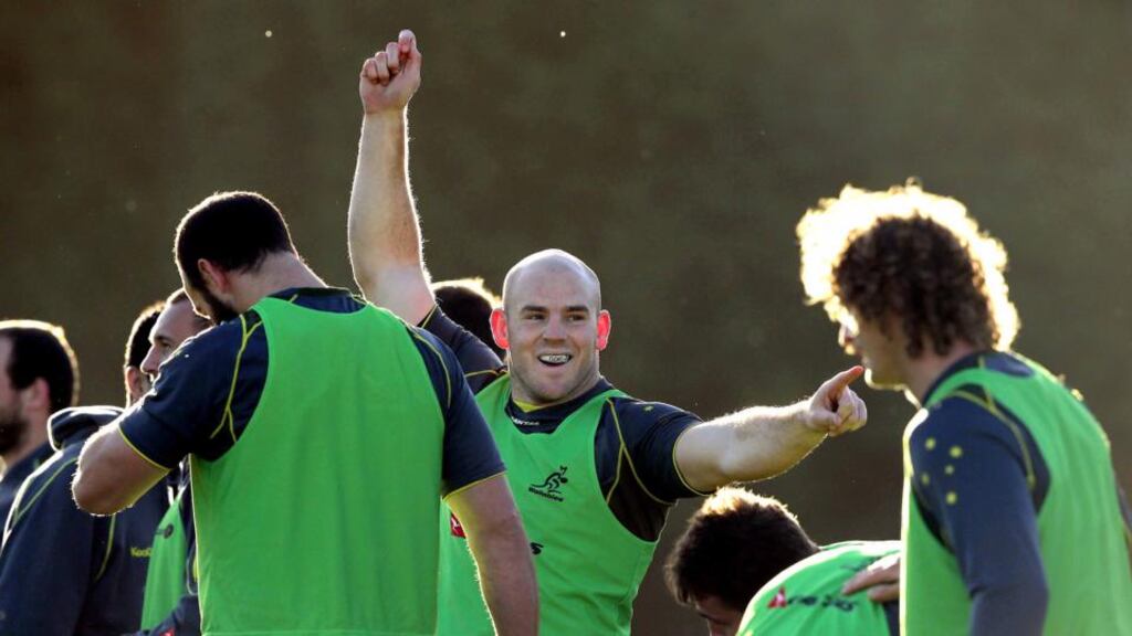 Stephen Moore (centre) training yesterday with the visiting Wallabies squad at Wanderers RFC in Dublin. Despite being born in Ireland and having strong Irish roots, the proud Australian will have no divided loyalties during Saturday’s international against Ireland. Photograph: Morgan Treacy/Inpho
