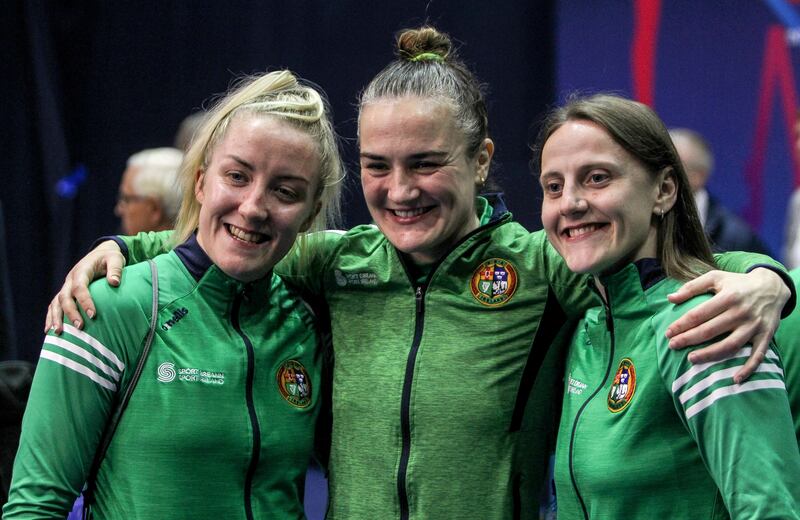 Ireland’s Christina Desmond, Kellie Harrington and Michaela Walsh celebrate after their medal victories. Photograph: Aleksandar Djorovic/Inpho