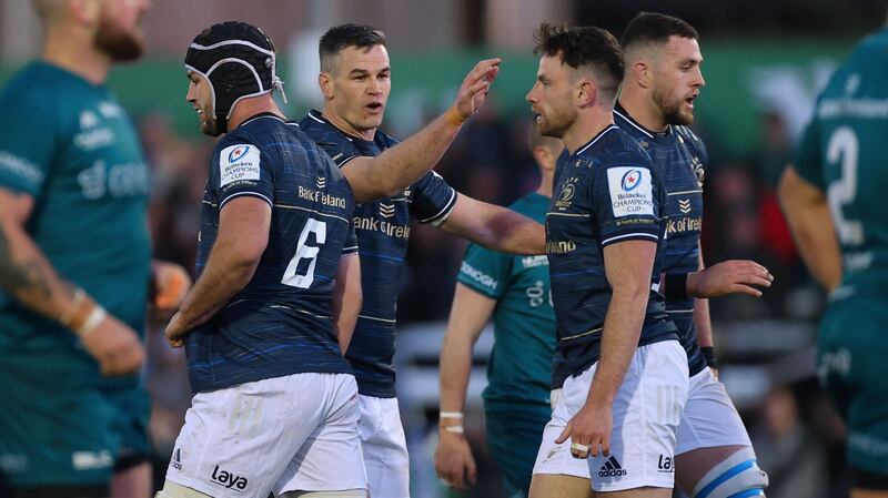 Leinster’s Johnny Sexton celebrates with Hugo Keenan in the Heineken Champions Cup Round of 16 First Leg against Connacht, at the Sportsground, Galway. Photograph: James Crombie/Inpho