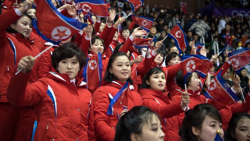 North Korean cheerleaders perform during a visit from US President Mike Pence in Pyeongchang. Photograph: Carl Court/Getty