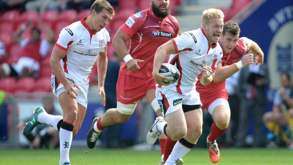 Ulster’s Stuart Olding makes a break during the province’s Pro12 draw with Scarlets at Parc y Scarlets, Wales, last Saturday. Photograph: Inpho