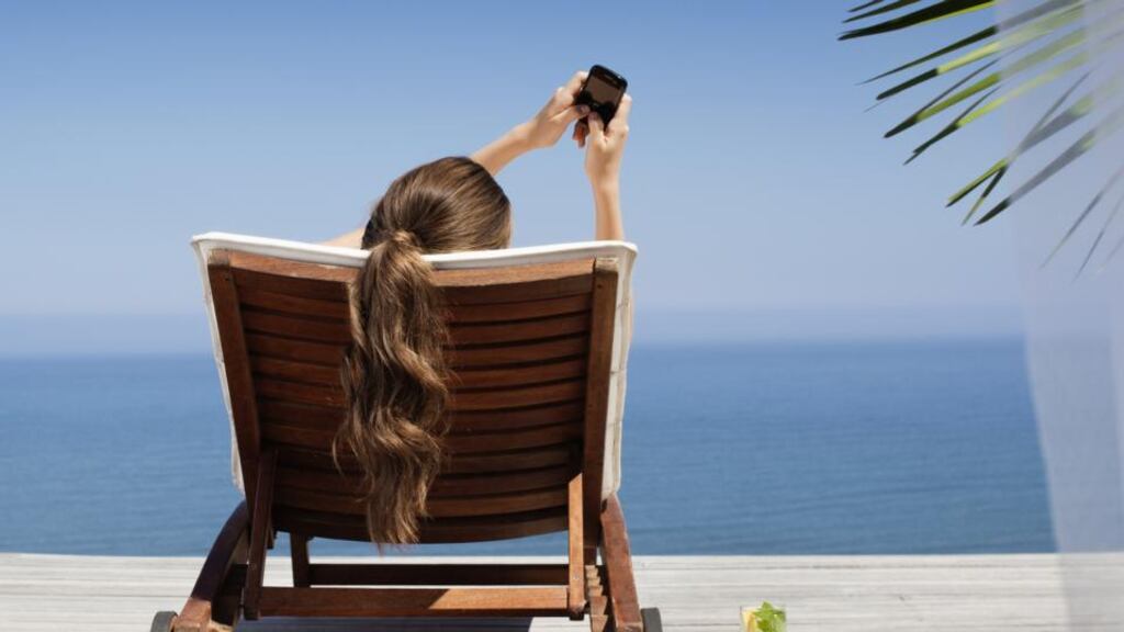 Hello to an influx of push notifications on the beach. Photograph: iStock