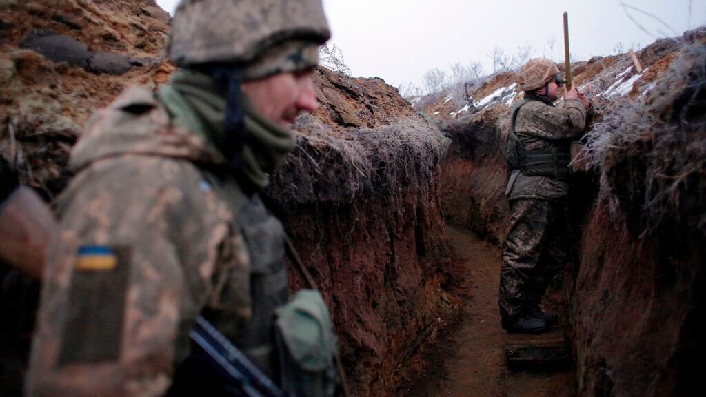 Ukrainian servicemen at a position on the front line with Russia-backed separatists near the village of Zhelobok, Lugansk region, January 18th. Photograph: Anatolii Stepanov/AFP via Getty