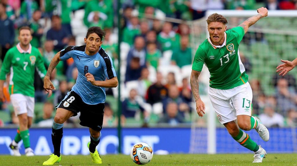 Ireland’s Jeff Hendrick in action against Uruguay’s Jonathan Urretaviscaya at the Aviva Stadium. Photograph: Oisin Keniry/Inpho