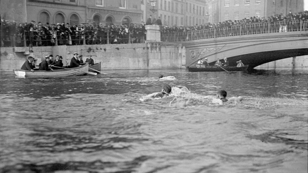 Competitors in the Lee Swim nearing the old North Gate Bridge, circa 1910. Photograph: courtesy of the Irish Examiner