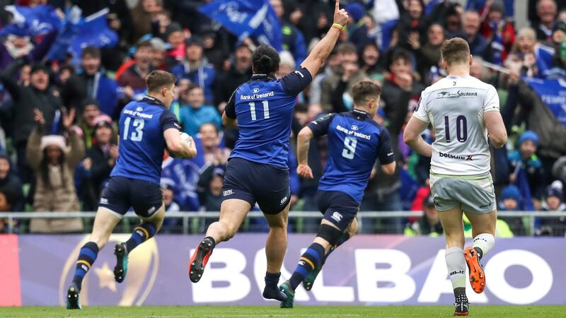 Leinster’s James Lowe celebrates as Garry Ringrose scores his try. Photograph: Tommy Dickson/Inpho