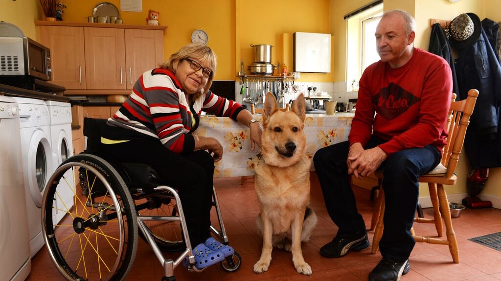 Shirley Keogh with her husband, Brendan, and dog, Molly, at their home in Co Kildare. Photograph: Cyril Byrne