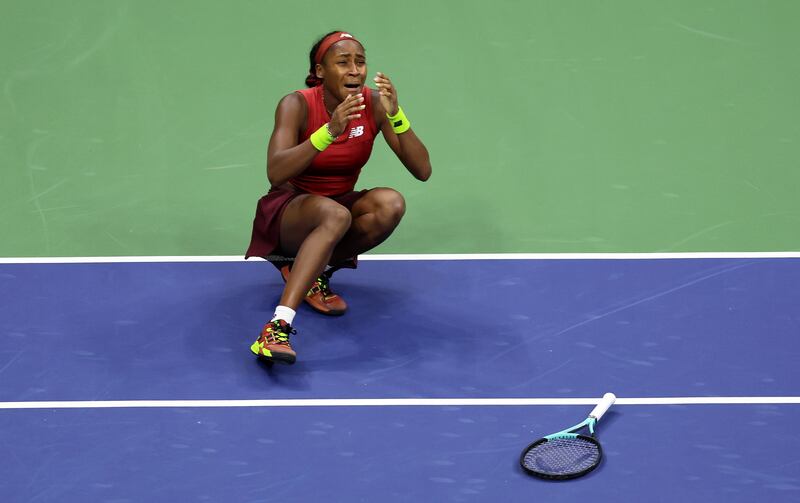 NEW YORK, NEW YORK - SEPTEMBER 09: Coco Gauff of the United States celebrates match point against Aryna Sabalenka of Belarus in their Women's Singles Final match on Day Thirteen of the 2023 US Open at the USTA Billie Jean King National Tennis Center on September 09, 2023 in the Flushing neighborhood of the Queens borough of New York City. (Photo by Clive Brunskill/Getty Images)