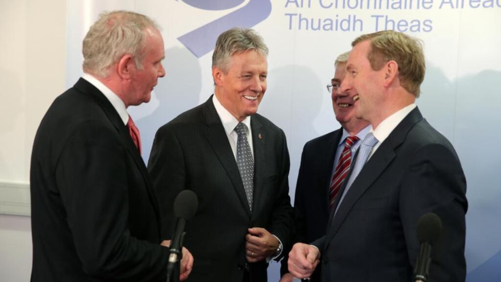 Deputy First Minister Martin McGuinness, First Minister Peter Robinson, Tánaiste Eamon Gilmore and Taoiseach Enda Kenny meet in Armagh yesterday. Photograph: Kelvin Boyes/PressEye.