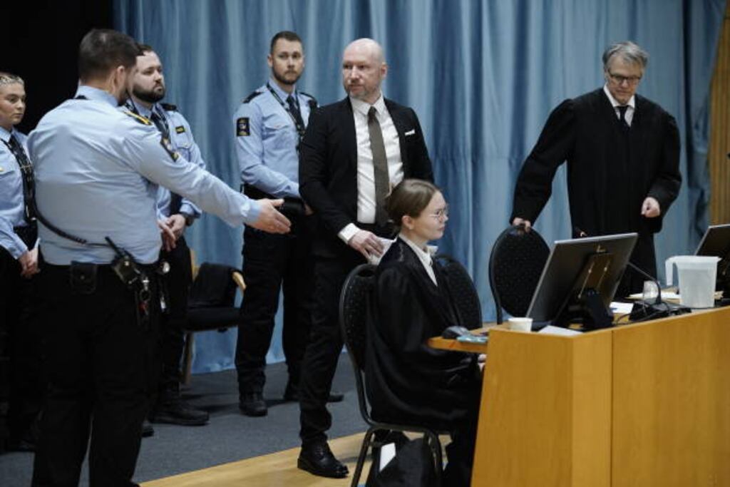 Anders Behring Breivik (centre) entering a court at Ringerike prison in Tyristrand, Norway, for his trial in January over his prison conditions. Photograph: Cornelius Poppe/NTB/AFP
