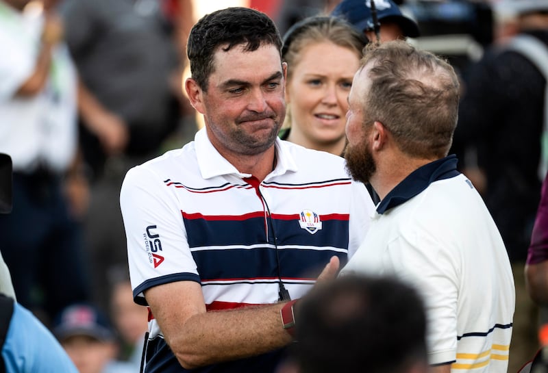 Keegan Bradley congratulates Team Europe’s Shane Lowry on winning the Ryder Cup. Photograph: Matthew Harris/Inpho