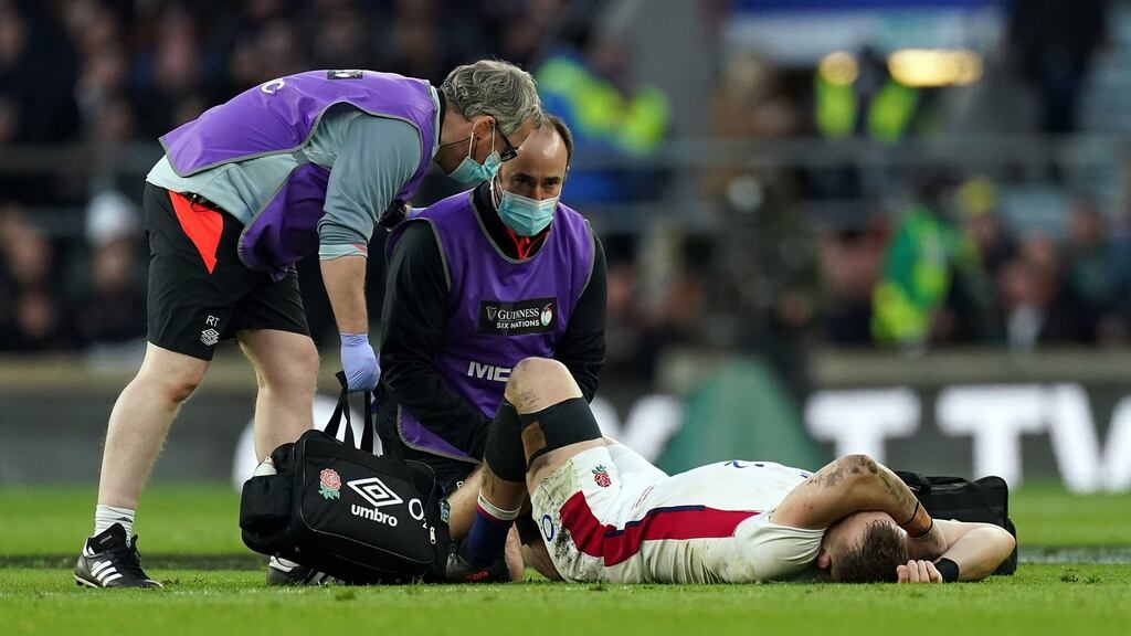 England’s Luke Cowan-Dickie receives treatment for an injury during the Six Nations match against Wales at Twickenham. Photograph: Mike Egerton/PA Wire