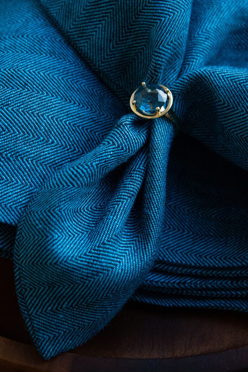 Forty Foot topaz ring for ¤980 with tweed scarf, both from Stable.