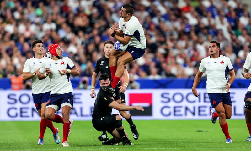 France’s Thomas Ramos is tackled by Will Jordan of New Zealand during the opening Rugby World Cup match at Stade de France. Photograph: Laszlo Geczo/Inpho