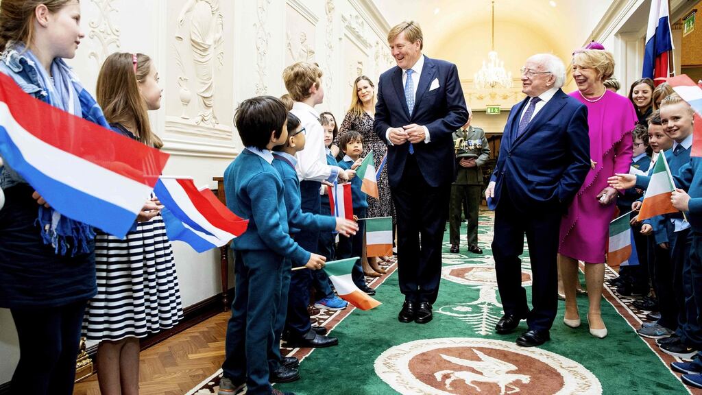 King Willem-Alexander of the Netherlands (centre) meets children as he is welcomed by President Michael Higgins (second right) and his wife Sabina (right) in Dublin on Wednesday. Photograph: Patrick Van Latwijk/AFP/Getty Images