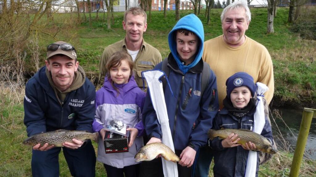 Caption for pic Junior winners at the opening day on the River Tolka. From left: J Brennan, Angler's Paradise (sponsors), V Kubik (2nd), D Cooney (3rd), G Losty (1st). At back: D Chew (DAI, sponsors), left, and C Emmett (chairman, TTAA).
