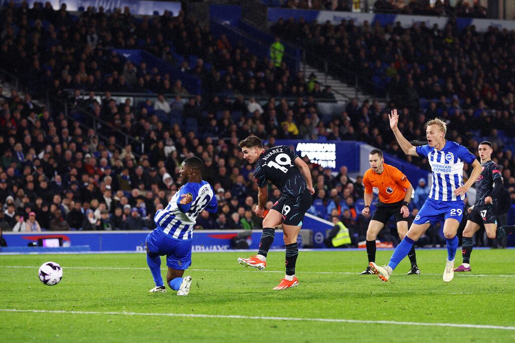 Julian Alvarez scores Manchester City's fourth goal during the Premier League game against Brighton at the Amex Stadium. Photograph: Clive Rose/Getty Images