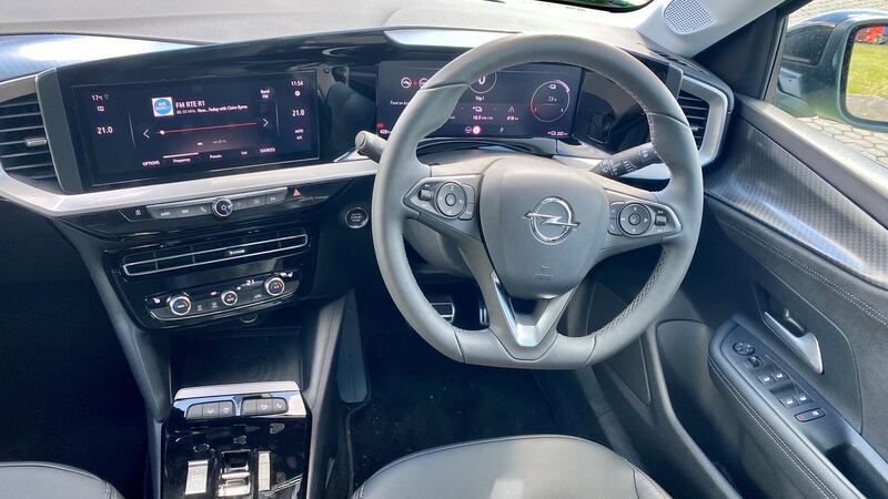 Inside, a bank of two screens greets the driver and when the car is off, it’s like being in an amusement arcade during a power cut