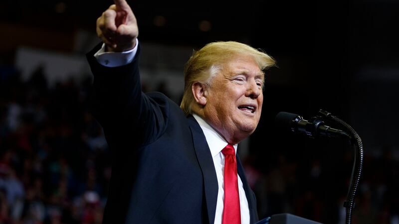 President Donald Trump during a campaign rally in Houston on Monday. Photograph: Evan Vucci/AP