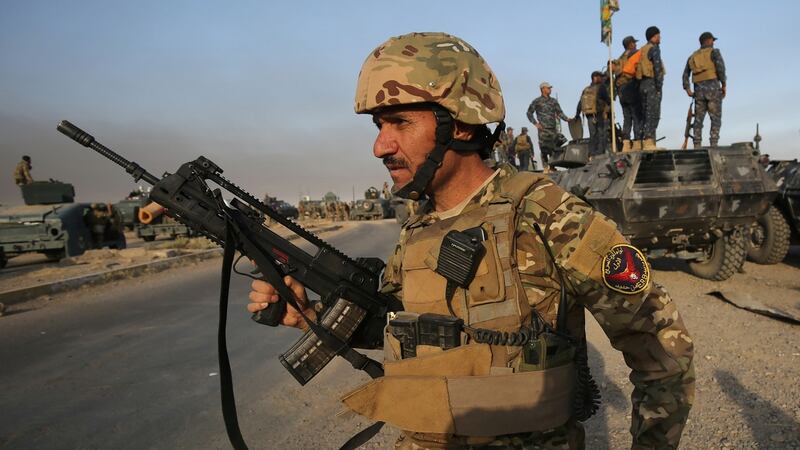 Iraqi forces gather in the area of al-Shourah some 45kms south of Mosul, as they advance towards the city to retake it from Islamic State. Photograph: Ahmad Al-Rubayeahmad/AFP /Getty Images