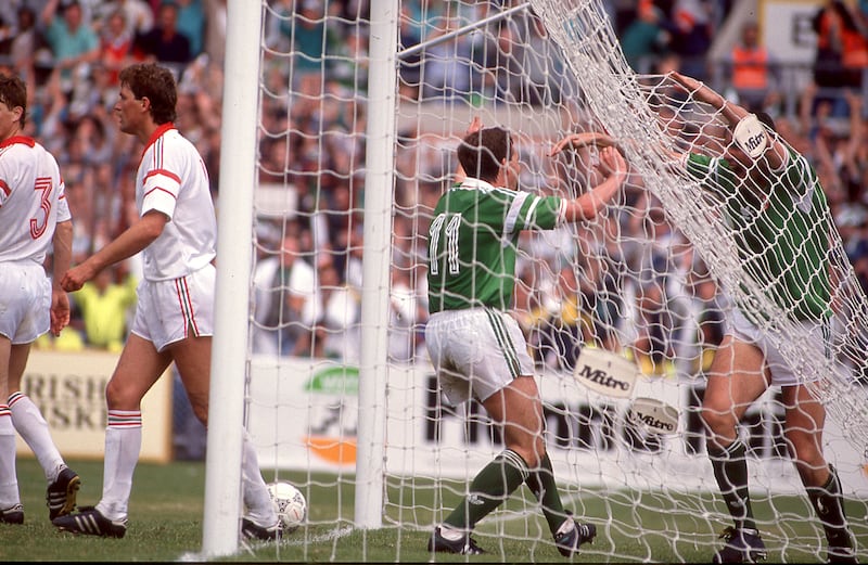 Kevin Sheedy celebrates with goalscorer Tony Cascarino (right) after he made it 2-0 against Hungary in the World Cup qualifier 36 years ago. Photograph: Billy Stickland/Inpho