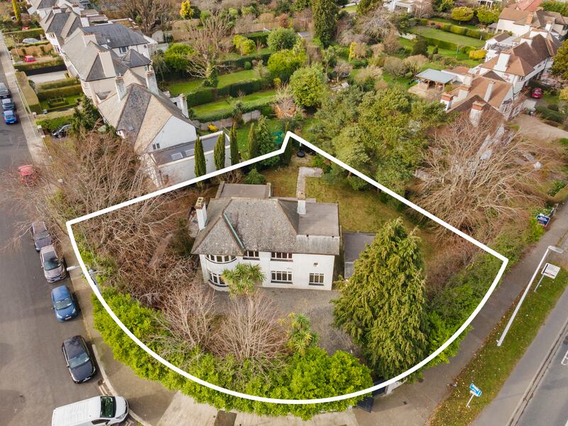 The property has wrap around gardens on a third of an acre