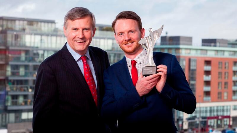 The 2016 winner of Leaders of Tomorrow, Vincent Forde, with Alastair Blair, managing director of Accenture