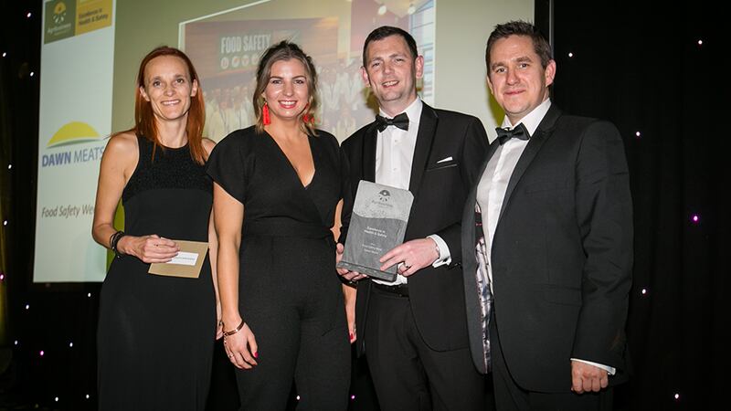 Oonagh Mc Nerney, Co - founder CEO, Visum presents the Excellence in Health & Safety award to Emma Dwane, Joe Calvey & John Coleman, Dawn Meats